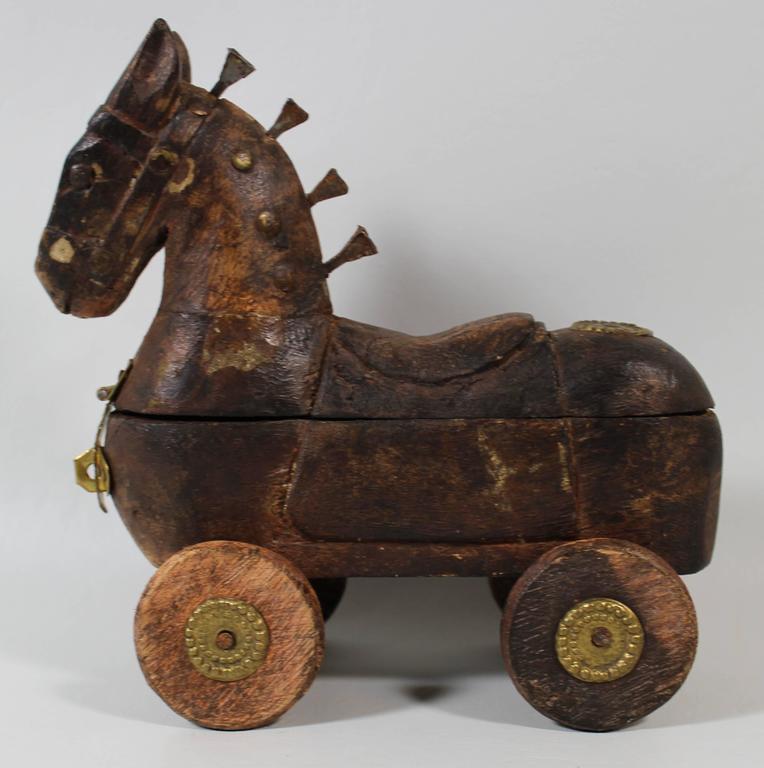 Folk Art Carved Wooden Horse on Wheels with Locking Storage Compartment