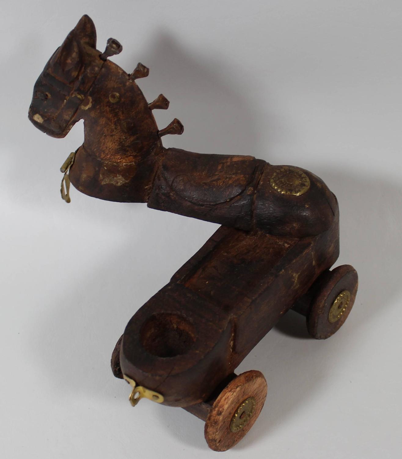Folk Art Carved Wooden Horse on Wheels with Locking Storage Compartment or Box at 1stdibs