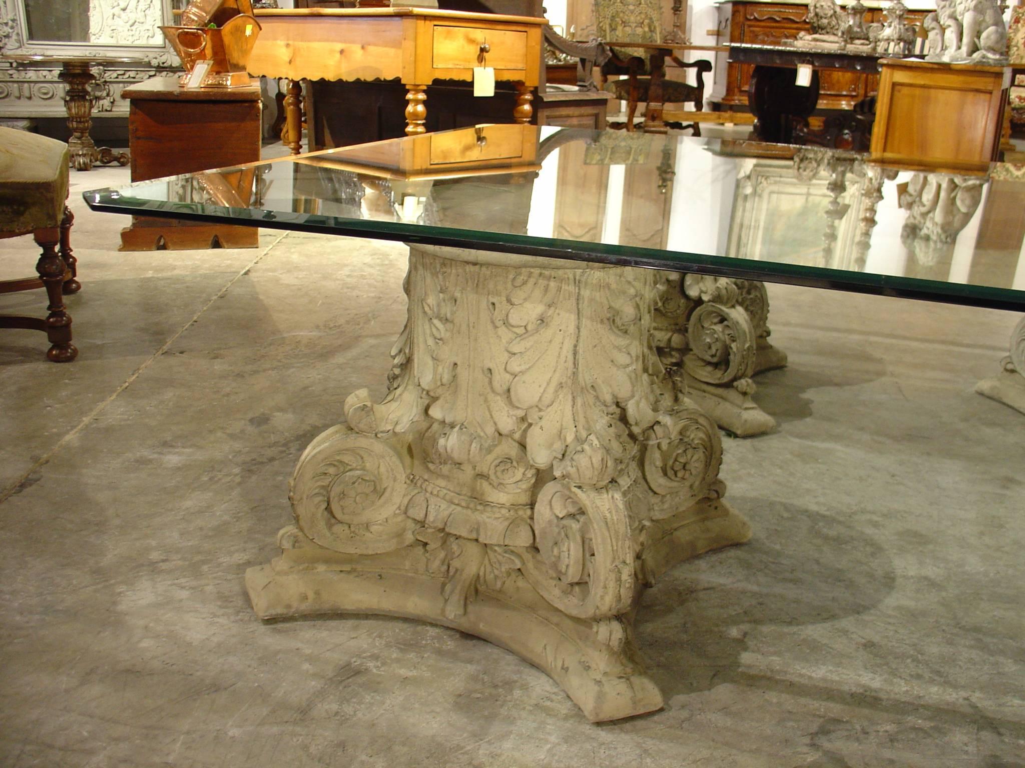 Beveled Glass Top Coffee Table on Cast Stone Corinthian Capital Bases