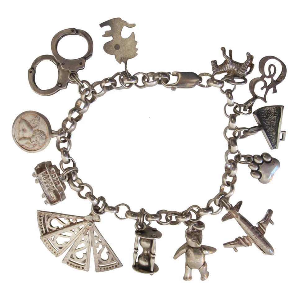 1950s Sterling Silver Charm Bracelet For Sale at 1stDibs