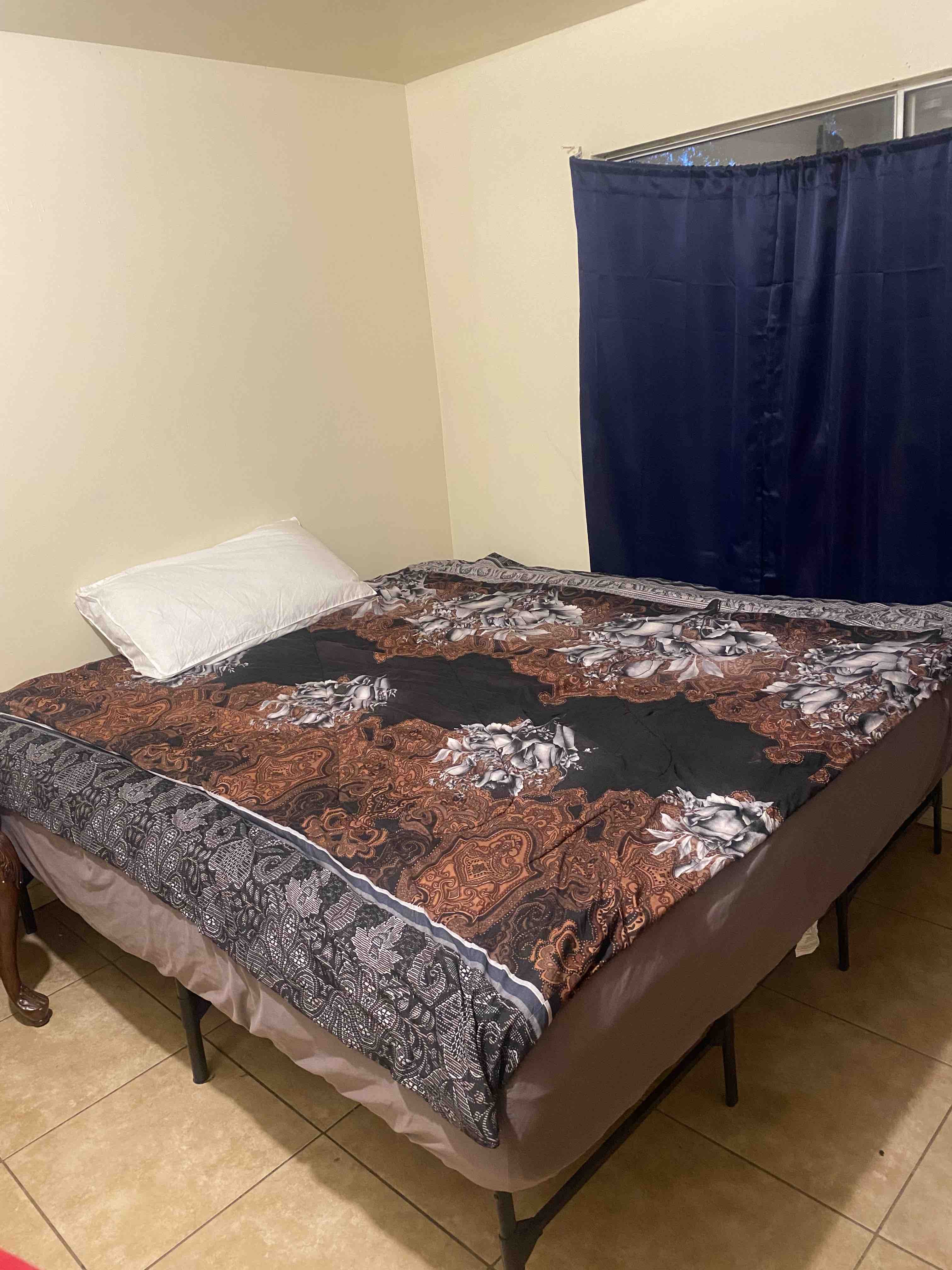 1 bedroom with a large queen size bed Houses for Rent