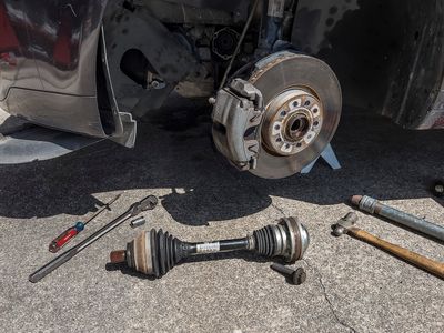 Torn CV Joint Boot / Front axle replacement Photo Gallery by Elliot