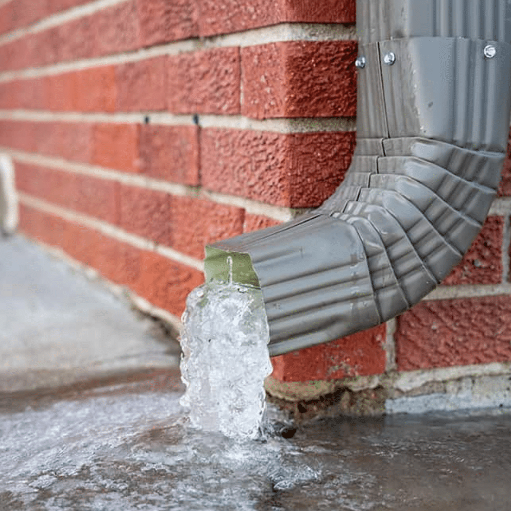 Ice in Downspouts Regina Basement & Foundaton Repair