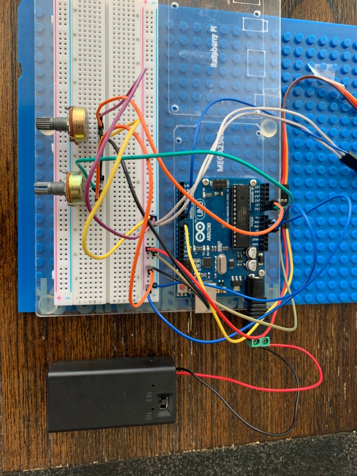 Controlling a Robotic Arm with Potentiometers Learn and Share