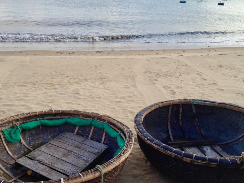 What Are the Round Basket Boats You See In Vietnam? A Bus On a Dusty Road