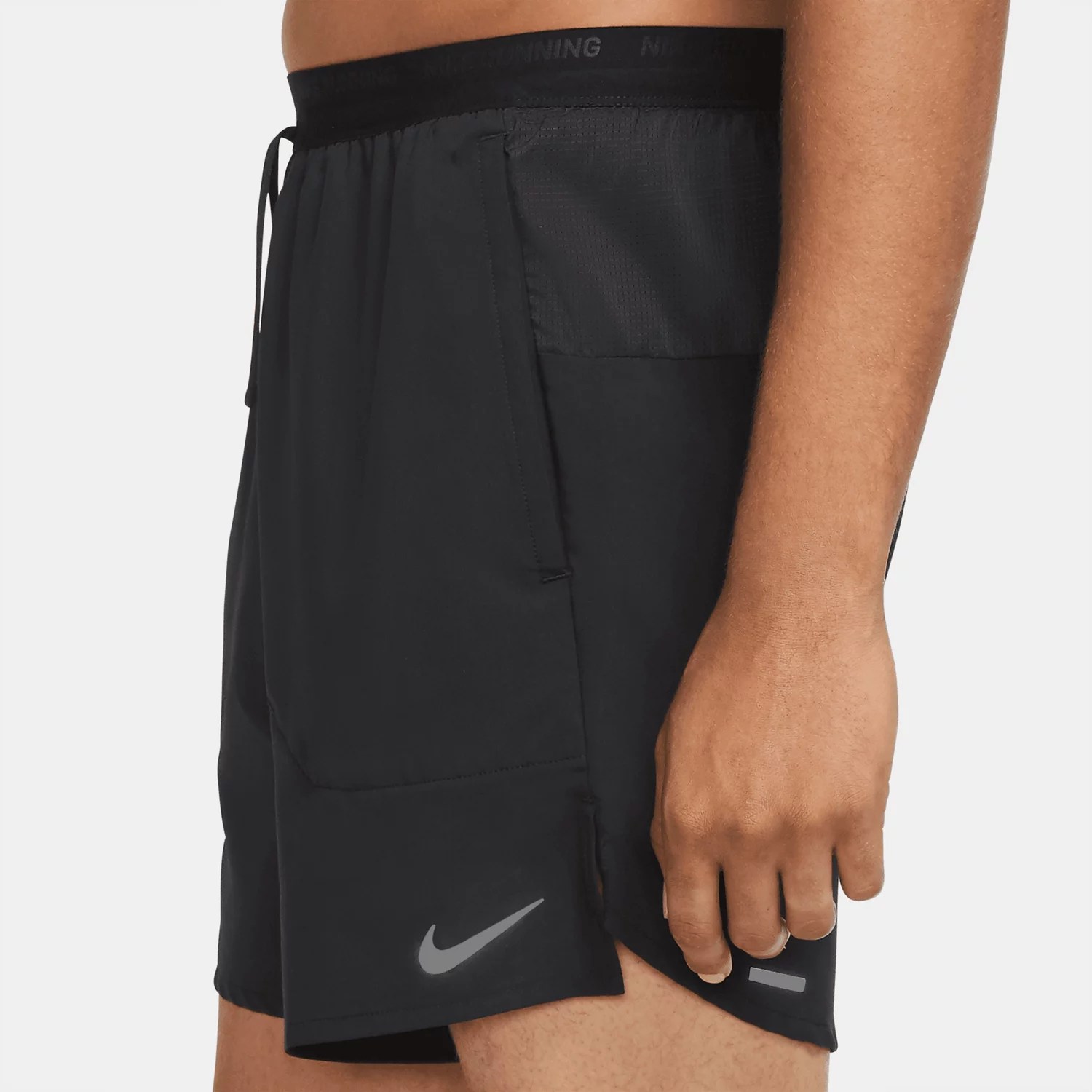 Nike Men's DriFIT Stride Unlined Running Shorts 7 in Academy