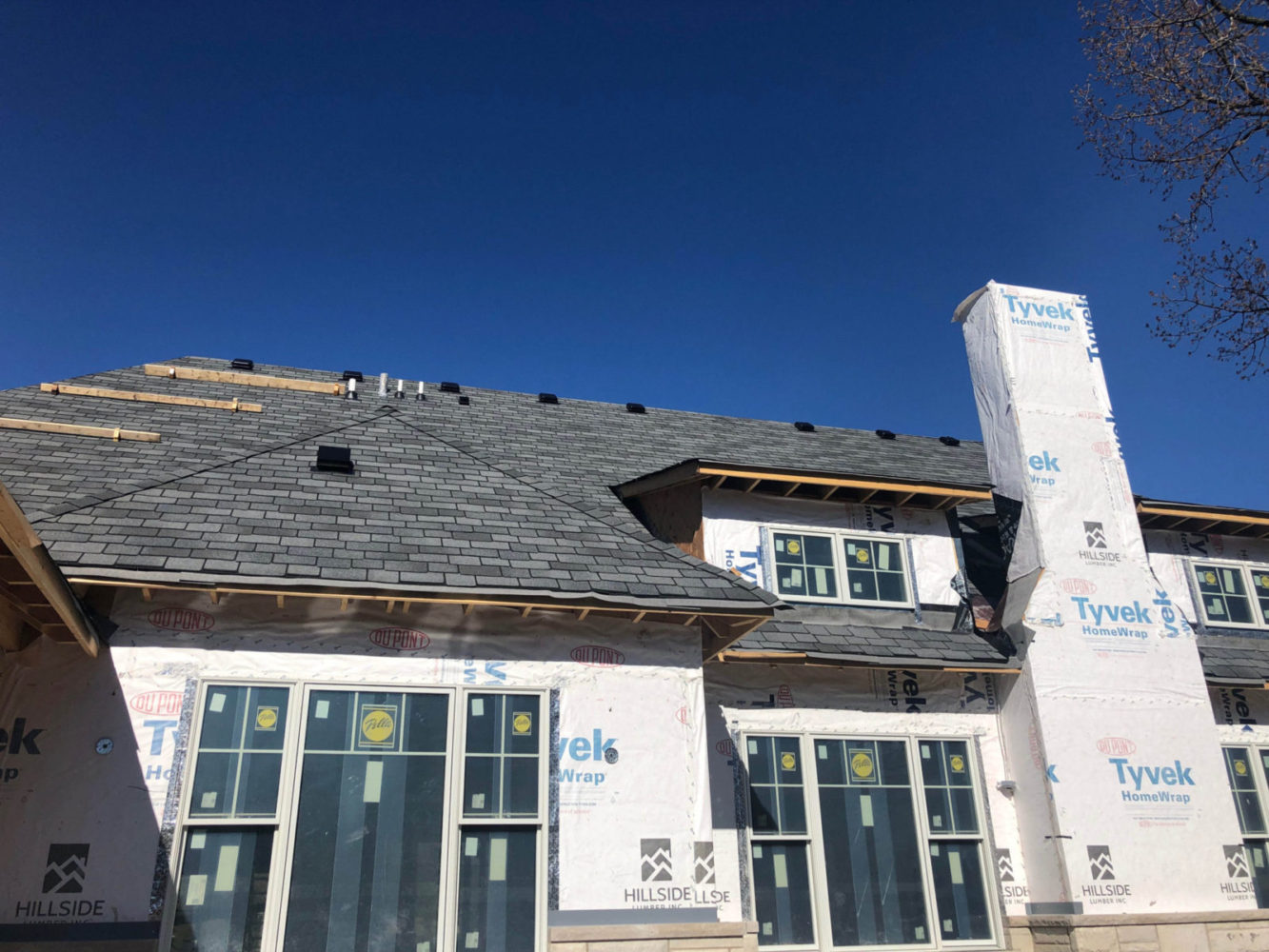 We used GAF Woodland roofing shingles on the spec house on North Branch