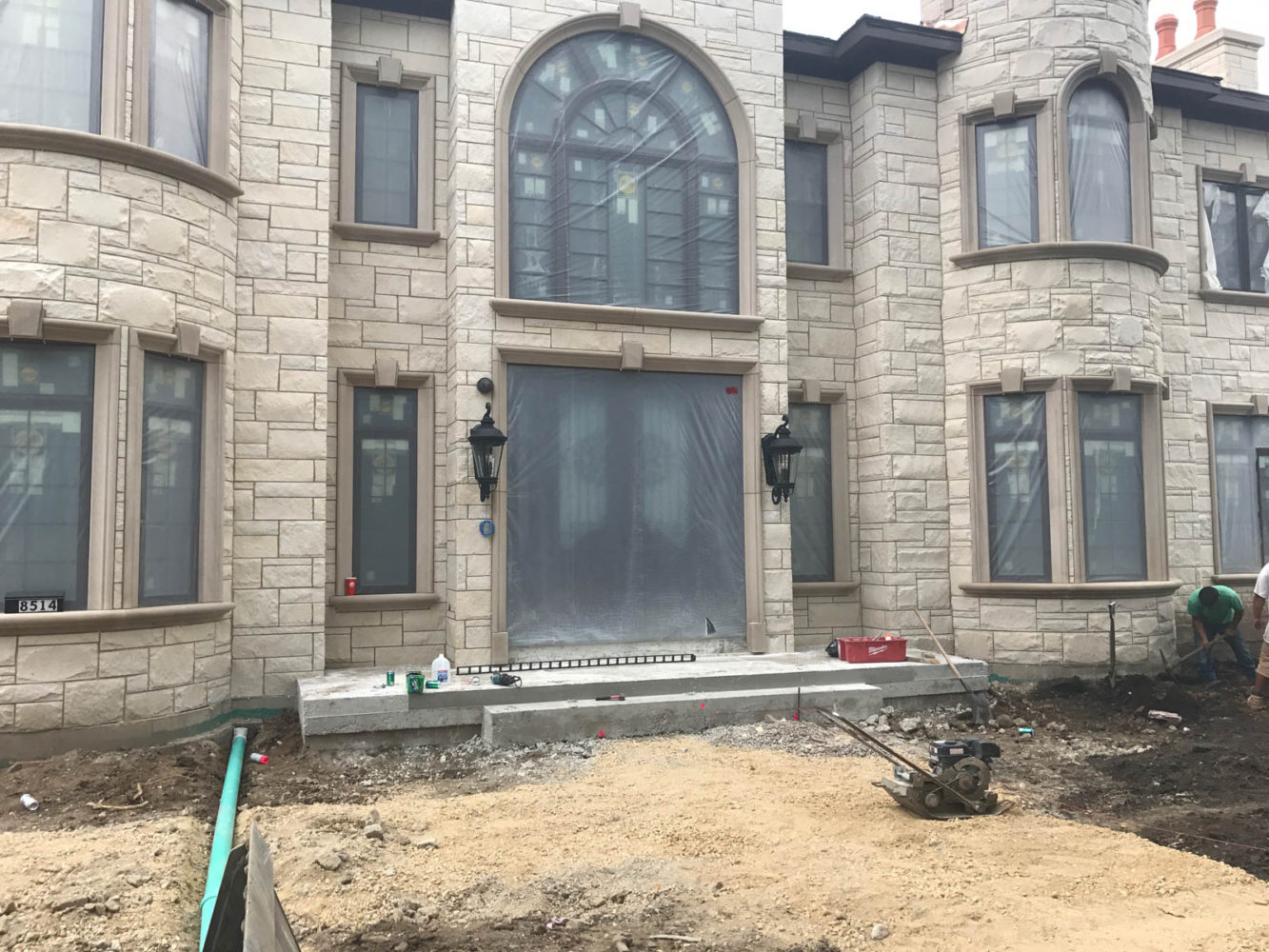 Redirecting the downspouts at the new construction in Morton Grove