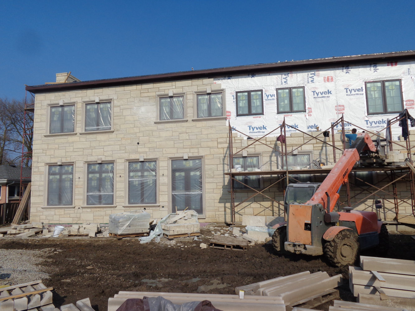The stone work continues on our new construction in Morton Grove