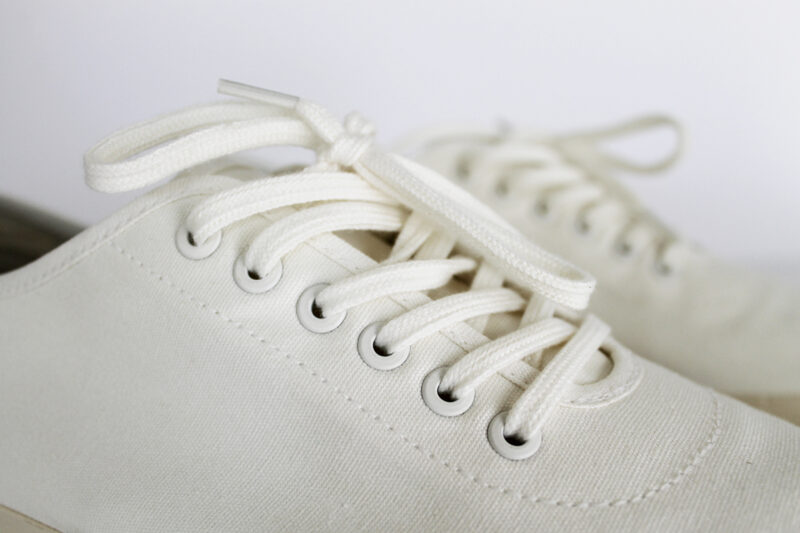 Learn how to clean white shoelaces and make your shoes look new again!