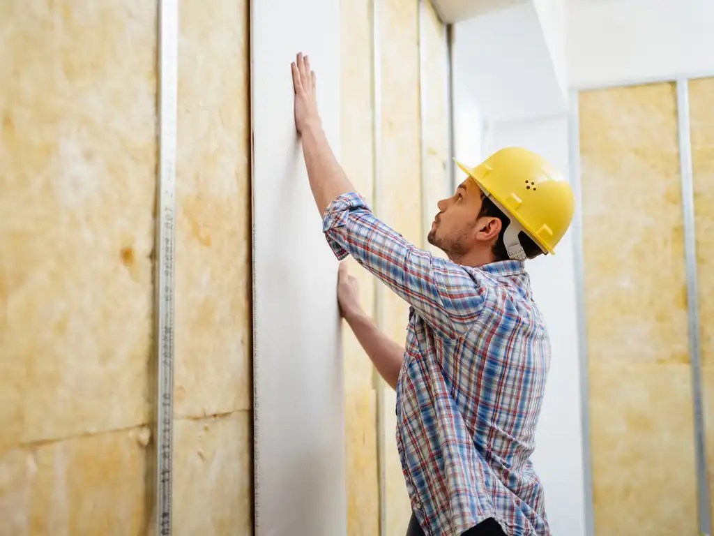 Plaster vs. Drywall Dissecting the Differences Bigrentz