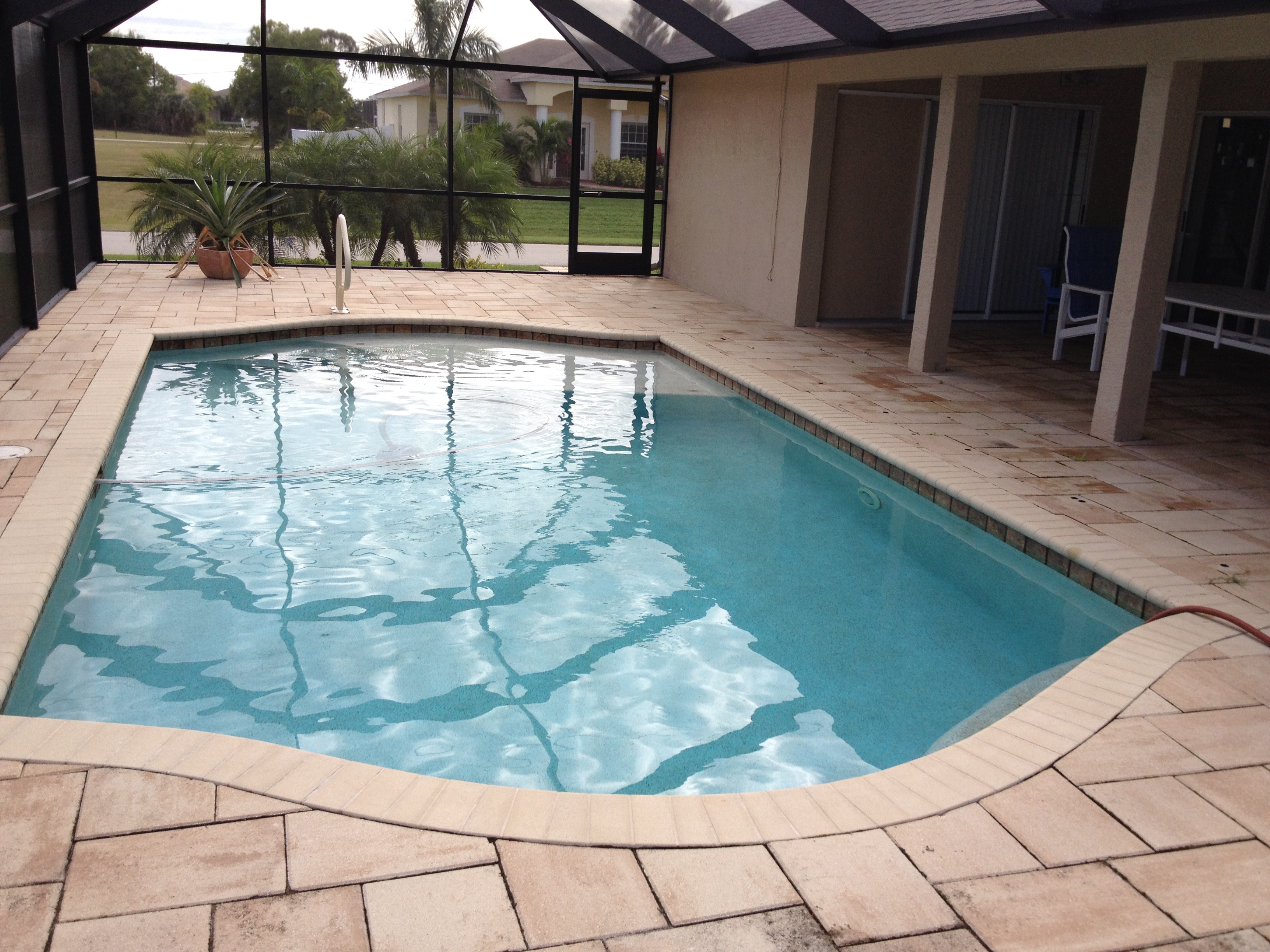 SE Cape Coral and Yacht Club pool homes under 300K