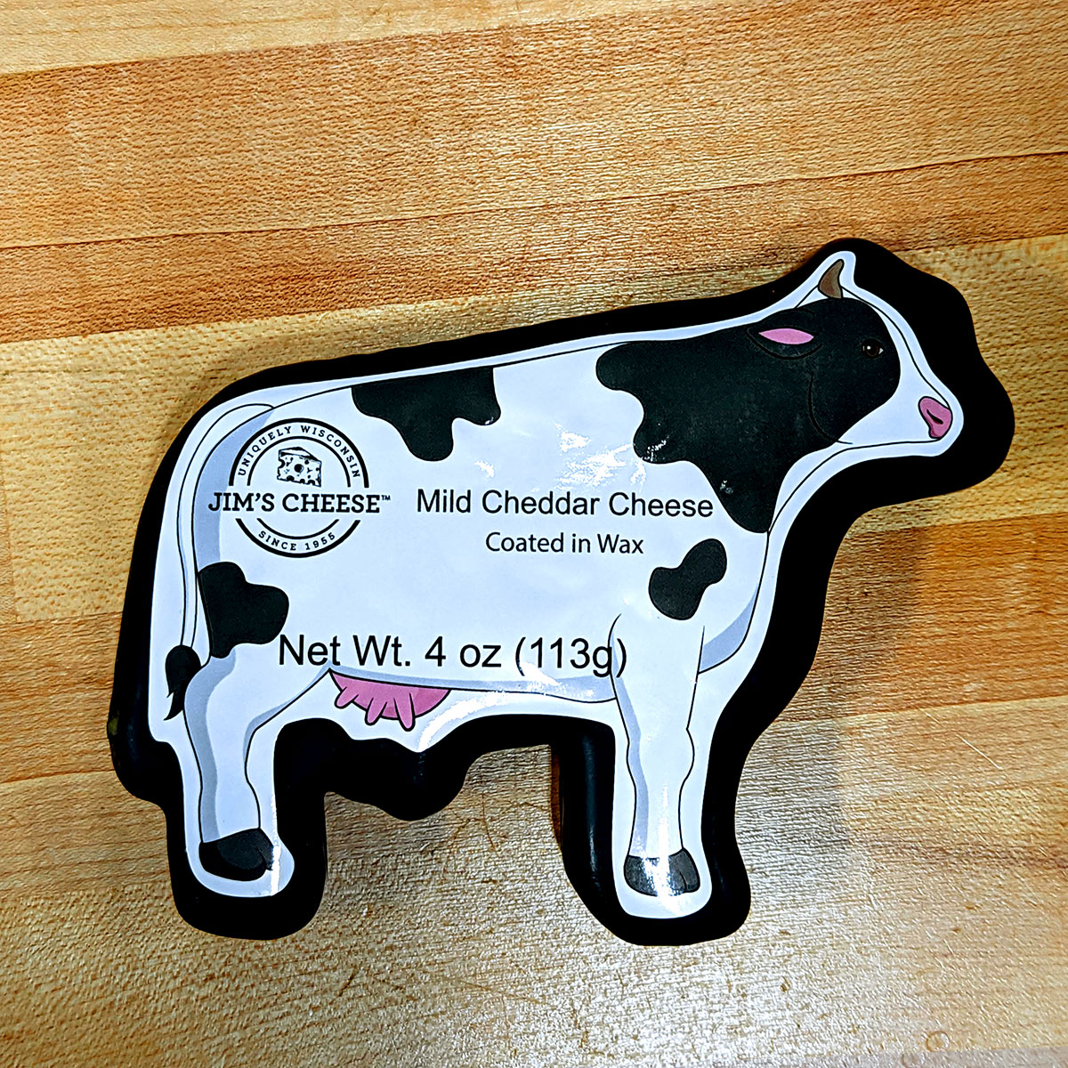 Mild Waxed Cheddar, Cow Shaped (4 oz.) Jim’s Cheese Adams Cheese Shop