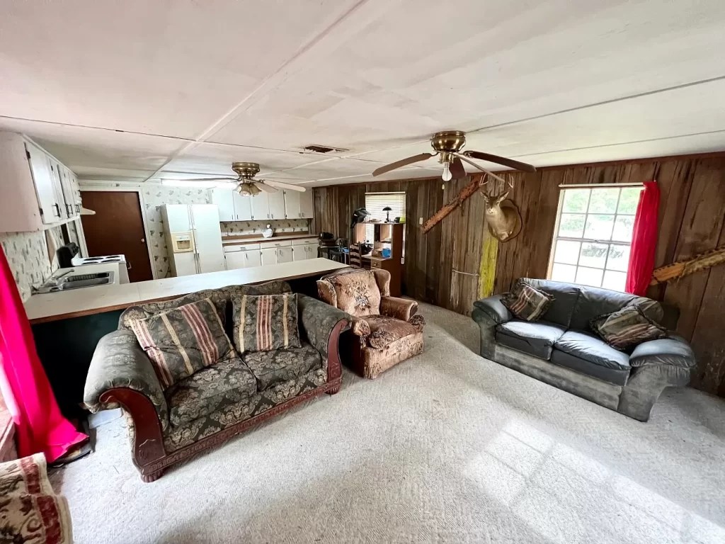 79 acres! Hunting camp, creeks & abundance of wildlife. 180,000