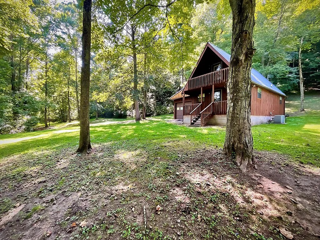 Hunting & Fishing Retreat on 80 Acres with River Frontage & Cozy Cabin
