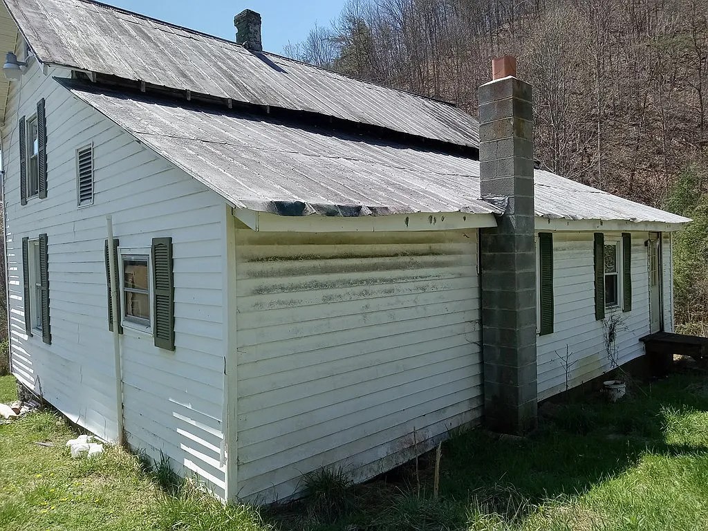 Expansive Farmhouse with Untouched Potential on 89 Acres. 225,000