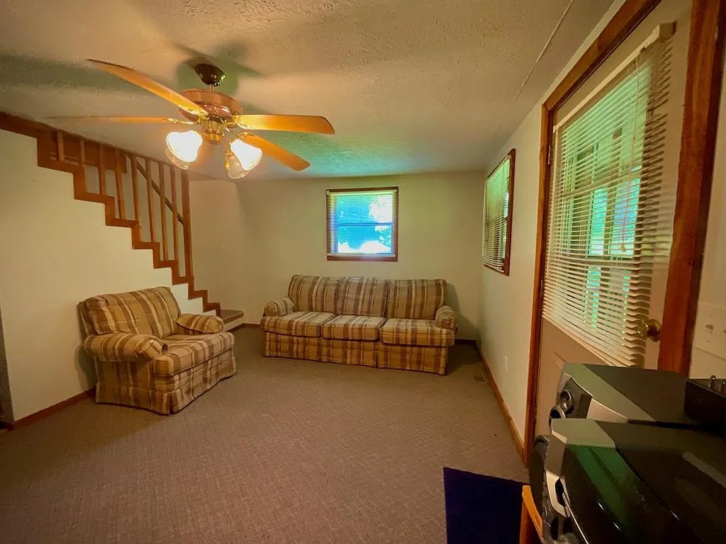 Hunting & Fishing Retreat on 80 Acres with River Frontage & Cozy Cabin