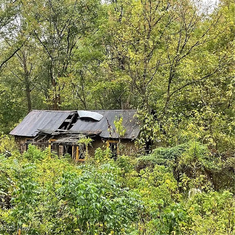 Private Retreat with River Access & Mature Timber on 39.44 Acres