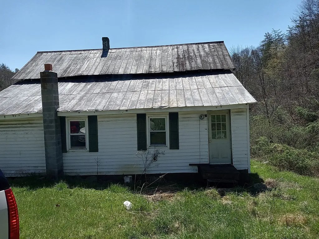Expansive Farmhouse with Untouched Potential on 89 Acres. 225,000