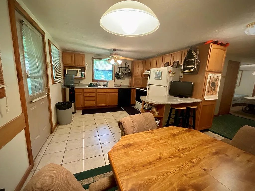 Hunting & Fishing Retreat on 80 Acres with River Frontage & Cozy Cabin