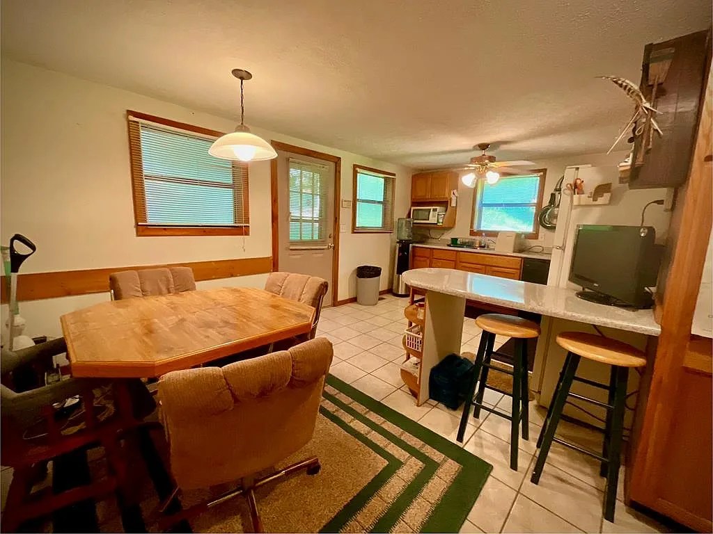 Hunting & Fishing Retreat on 80 Acres with River Frontage & Cozy Cabin