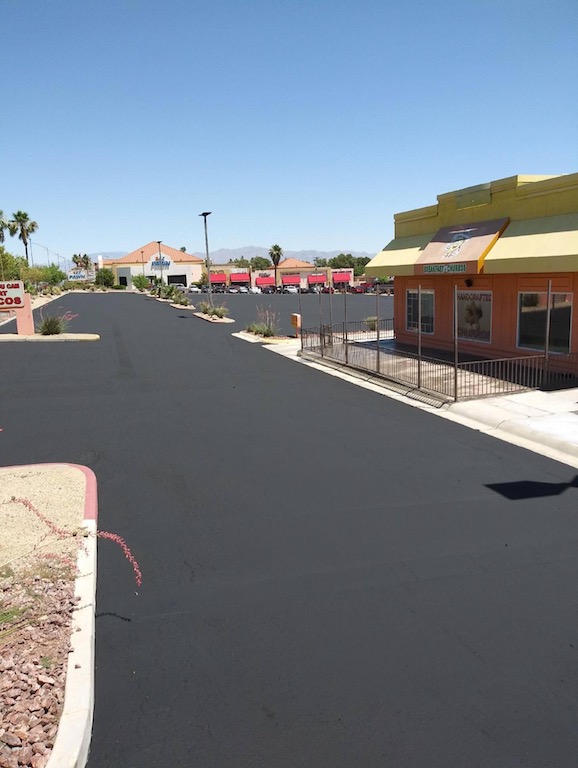 Will Asphalt Sealcoating Cover Oil Stains?