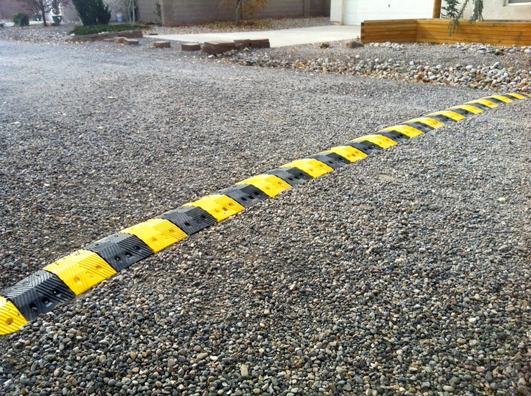 Speed Control Bumps on Gravel Road.