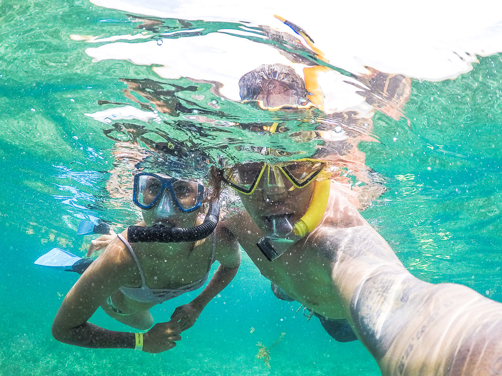 Swimming with Sharks in Belize Caveman Snorkeling Tours