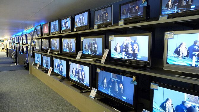 What are some of the challenges that need to be addressed in order for smart TVs to become more widely adopted