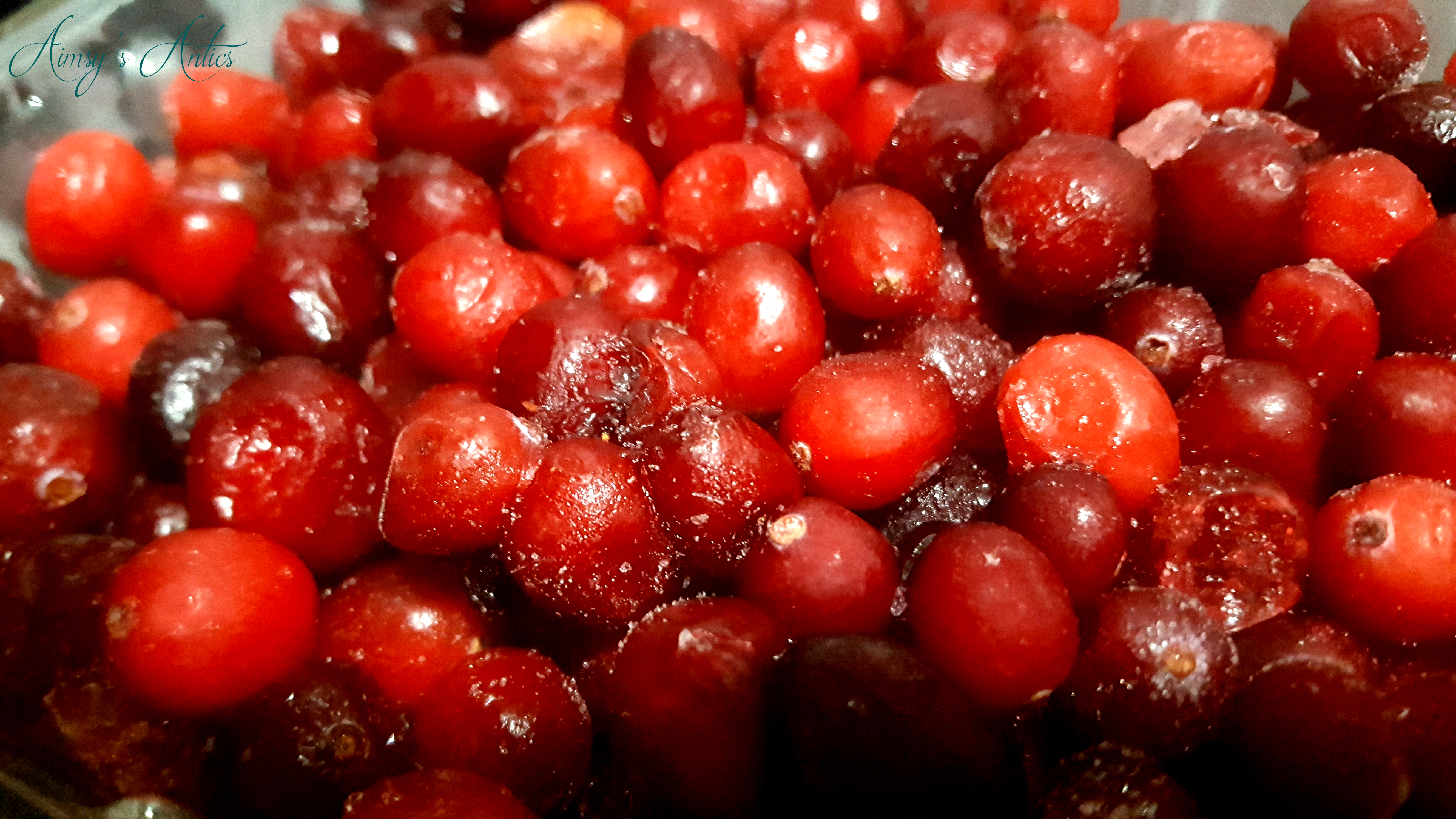 Image of many frozen cranberries.