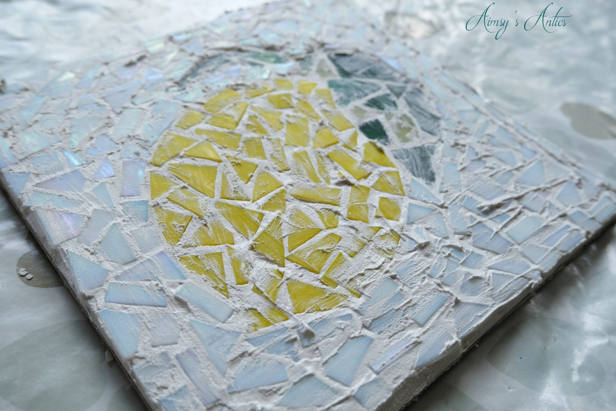 Grout added to the mosaic