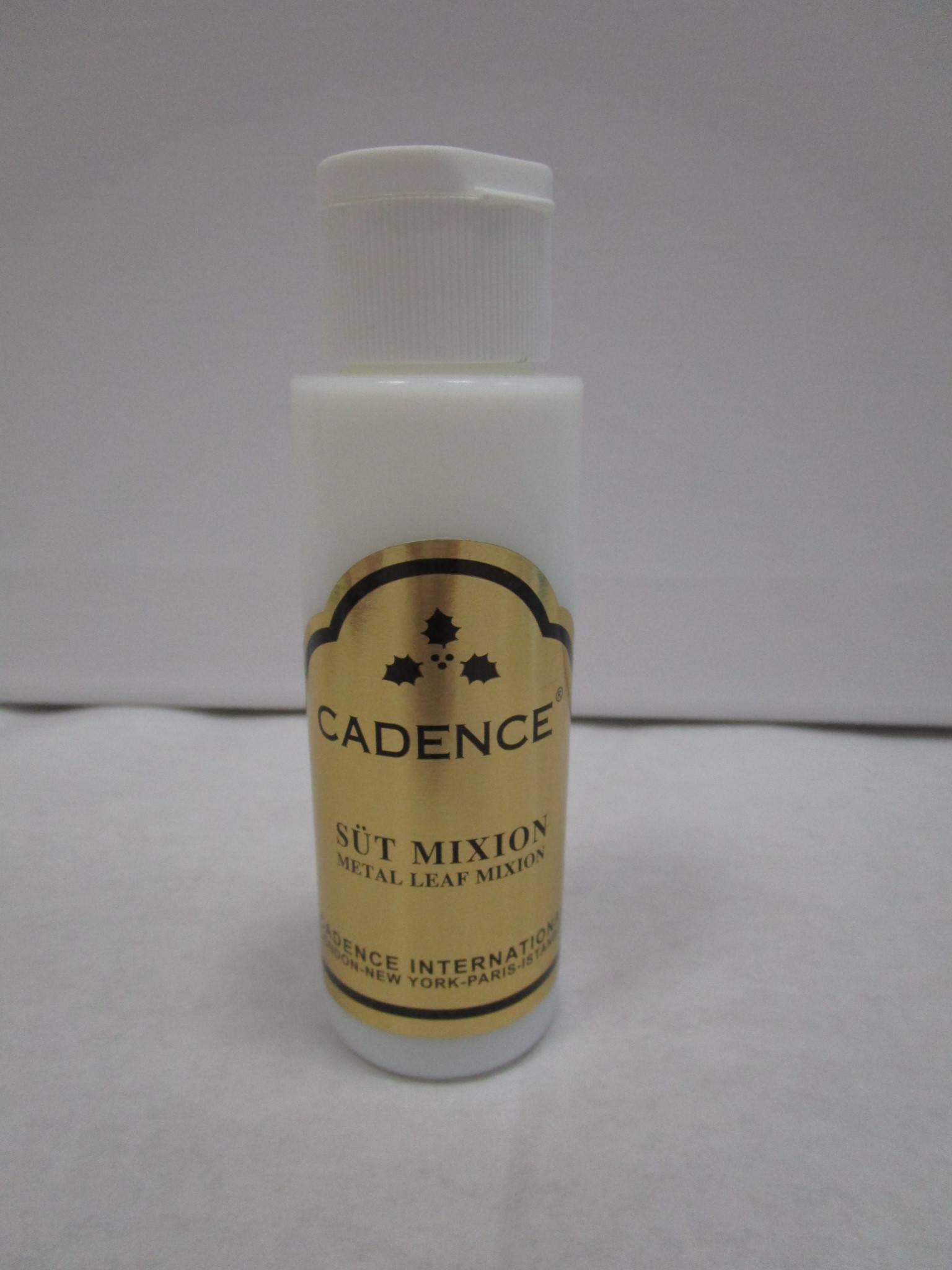 Glue for metal leaves and flakes