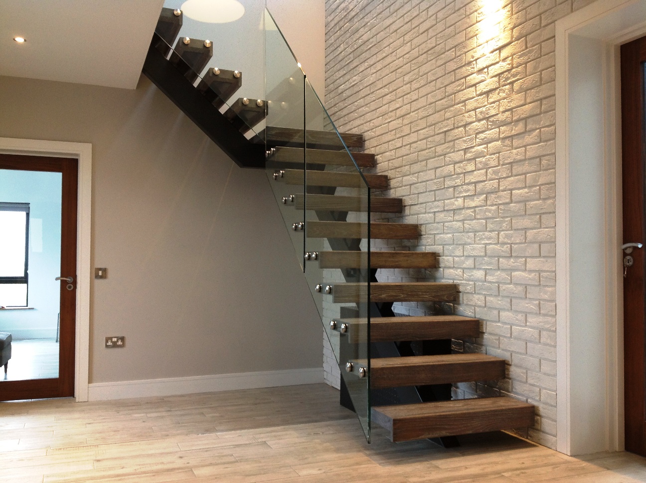 Steel spine stairs Designed and Fitted by AJD for Customer in Cork