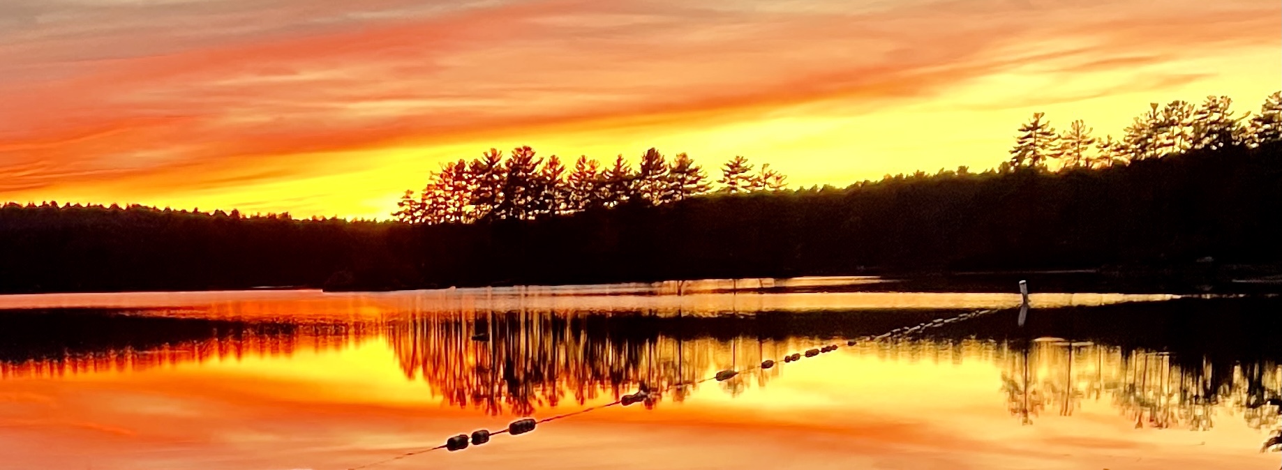 Sun set over Bare Hill Pond alan j quinn