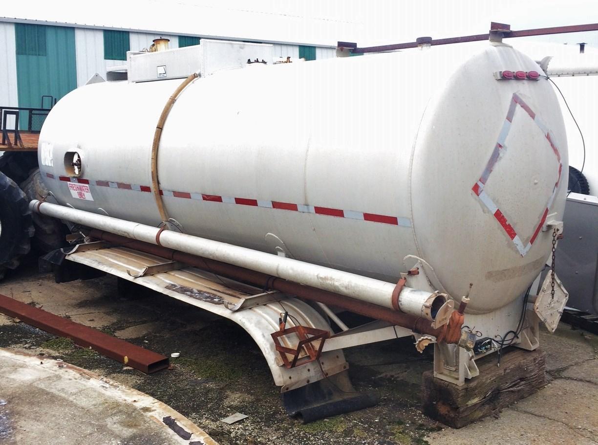 Albrecht Auctions Aluminum 4000Gallon Water Tank, Came Off a