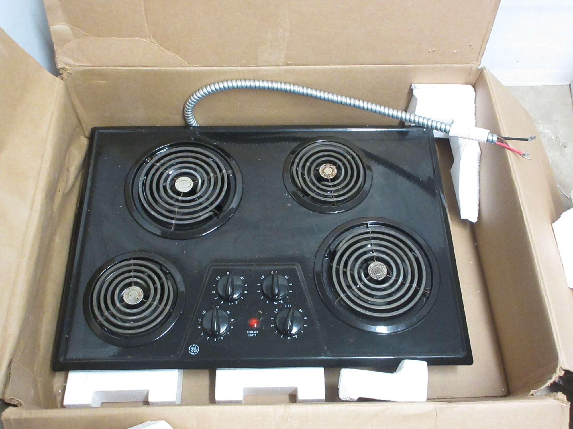 Albrecht Auctions FourBurner GE Electric Stove Top