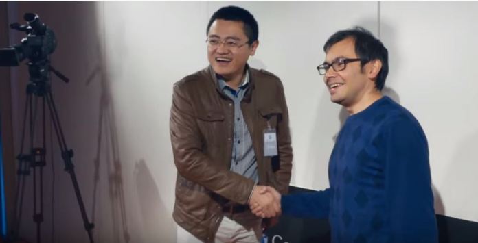 DeepMind's AlphaGo Defeats European Go Champion Fan Hui. Fan Hui with Demis Hassabis