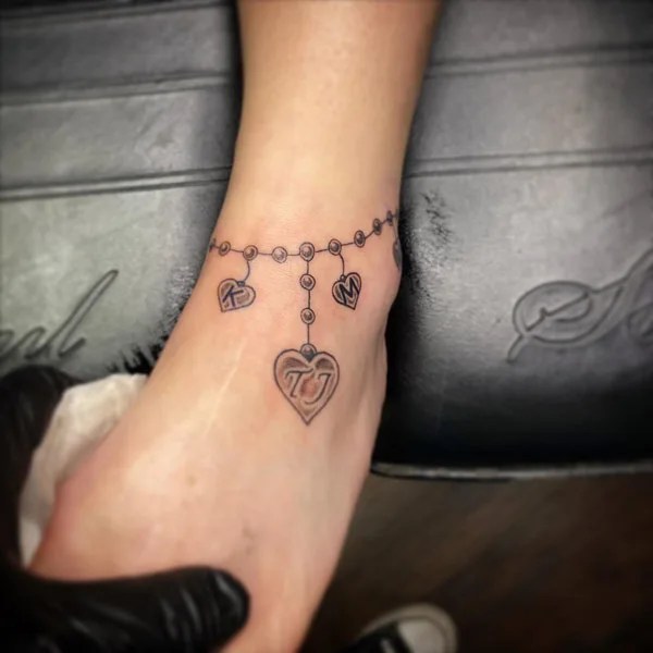 Aggregate 135+ charm bracelet tattoo with initials best camera.edu.vn