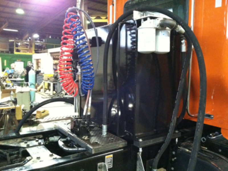 Hydraulic wet line systems and tanks