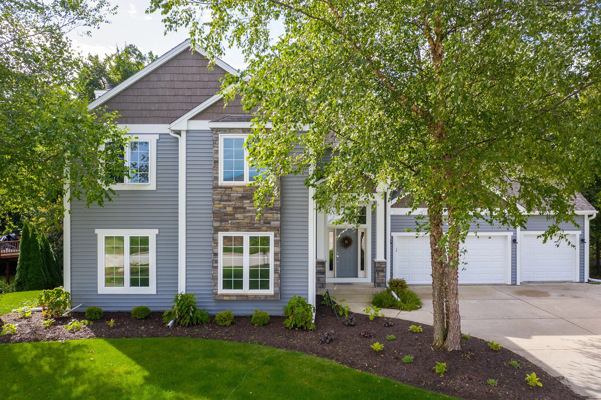Vinyl Siding with Stone Veneer Accents Allrite Home & Remodeling