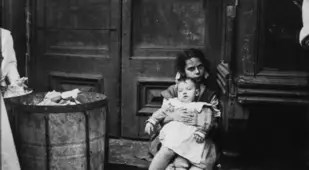Jacob Riis Photographs Girl Holding Baby