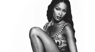 Naomi Campbell On A Leopard Tablecloth
