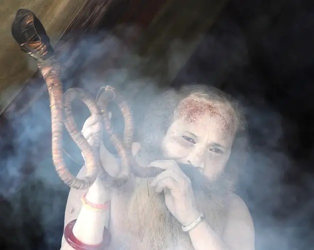 Man Smoking Long Pipe