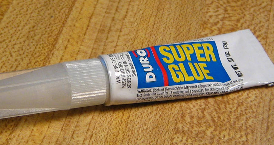Container of super glue