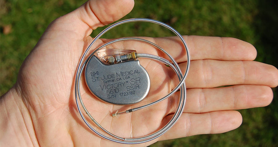 Someone holding a pacemaker