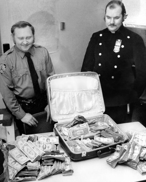 Police Pose With Mr. Untouchable Bribe Money