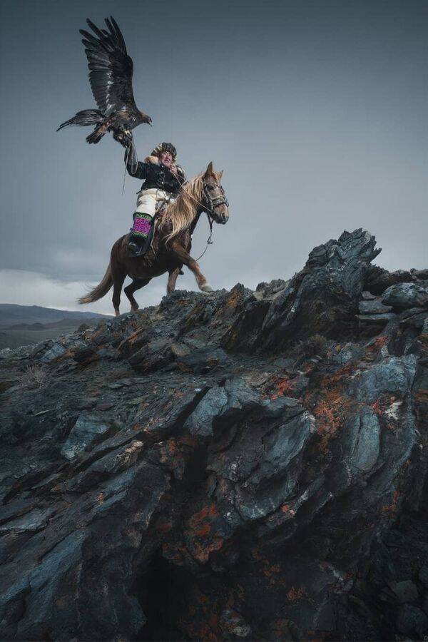 Mongolian Hunter Carrying His Eagle