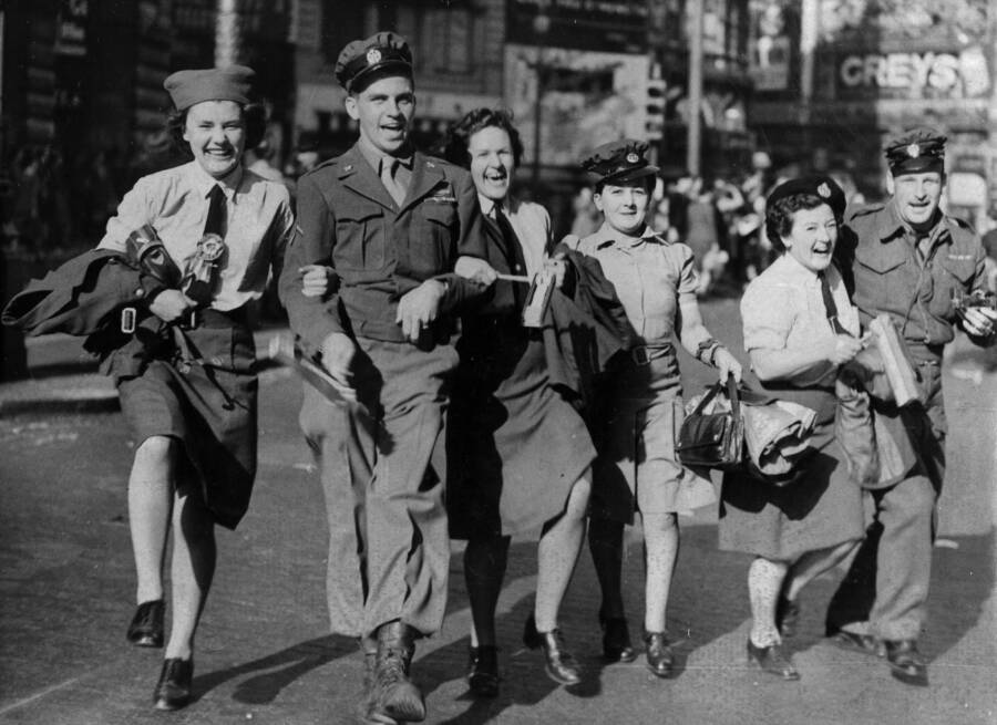 Waafs Link Arms During Vj Day