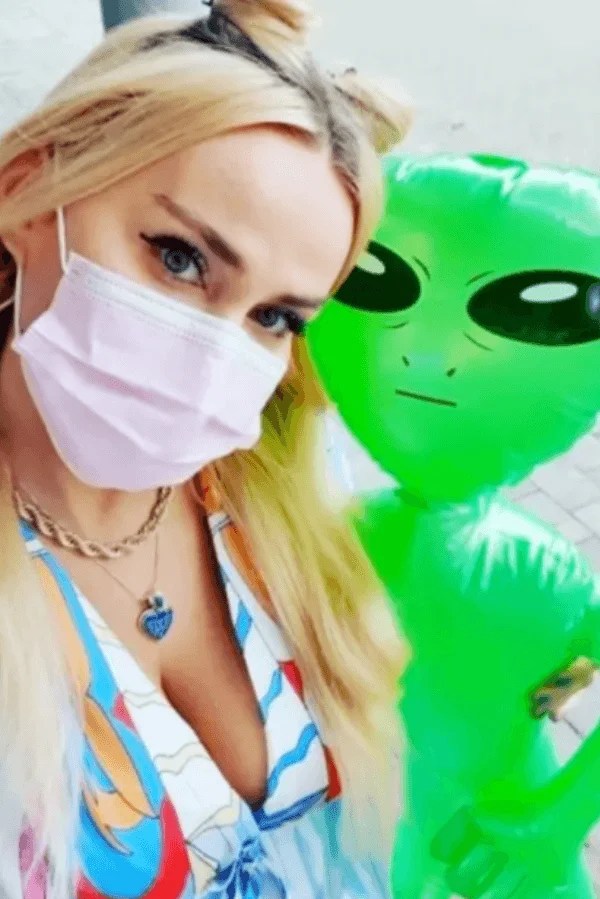 Abbie Bela Holding Alien