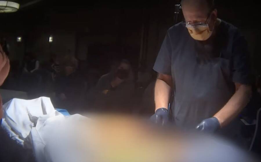 Doctor Performing David Saunders Autopsy